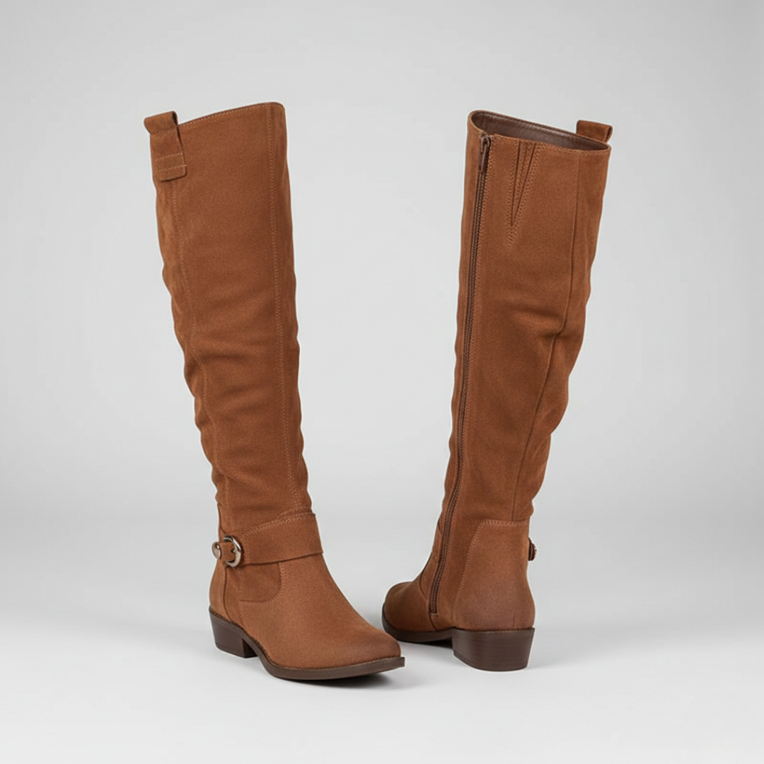 A pair of knee-high brown boots with side buckles, featuring a smooth finish and low stacked heel for comfort and style.