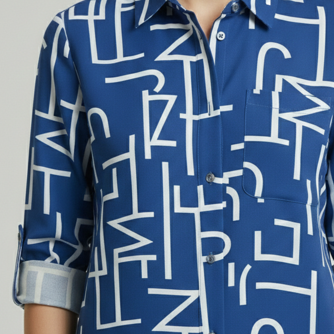 Blue geometric print shirt with a tailored silhouette, long sleeves, and a polished collar, ideal for fall and spring fashion.