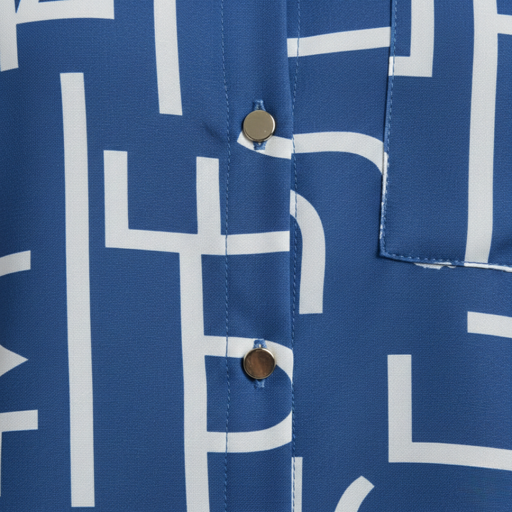 Blue geometric print shirt with a tailored silhouette, long sleeves, and a polished collar, ideal for fall and spring fashion.