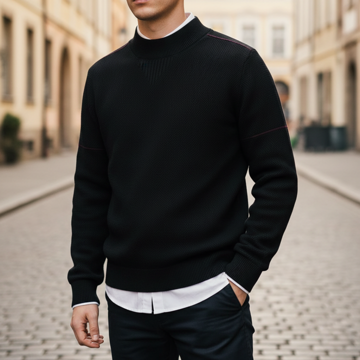 Avelise Orion textured knit sweater in neutral color, showcasing its cozy, detailed knit pattern on a flat lay.